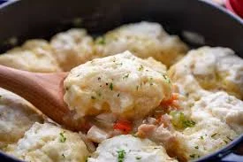 "Golden Bisquick dumplings served in broth"